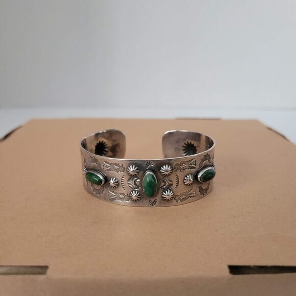 Vintage Navajo Sterling Silver Repoussé Cuff Bracelet With Turquoise Stones